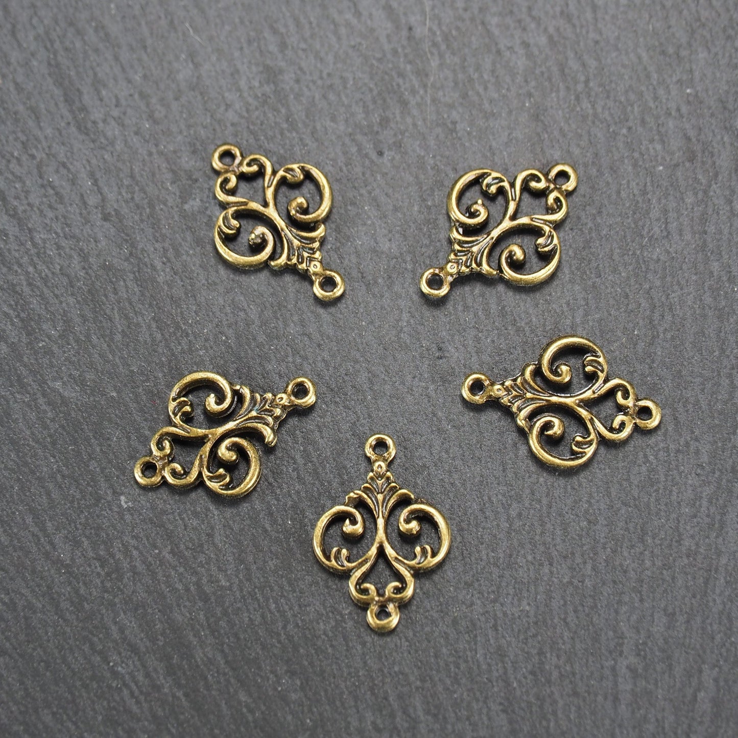 10 Verbinder filigranes Ornament, bronzefarben, 10840