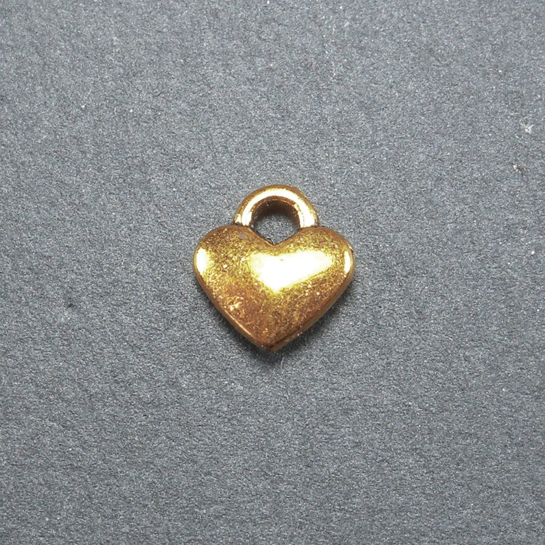 20 Anhänger kleines Herz antik goldfarben, 10080