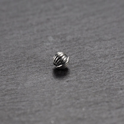 20 kleine Perlen 4mm, geriffelt, antik silberfarben, 10233