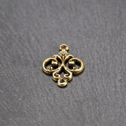 10 Verbinder filigranes Ornament, bronzefarben, 10840
