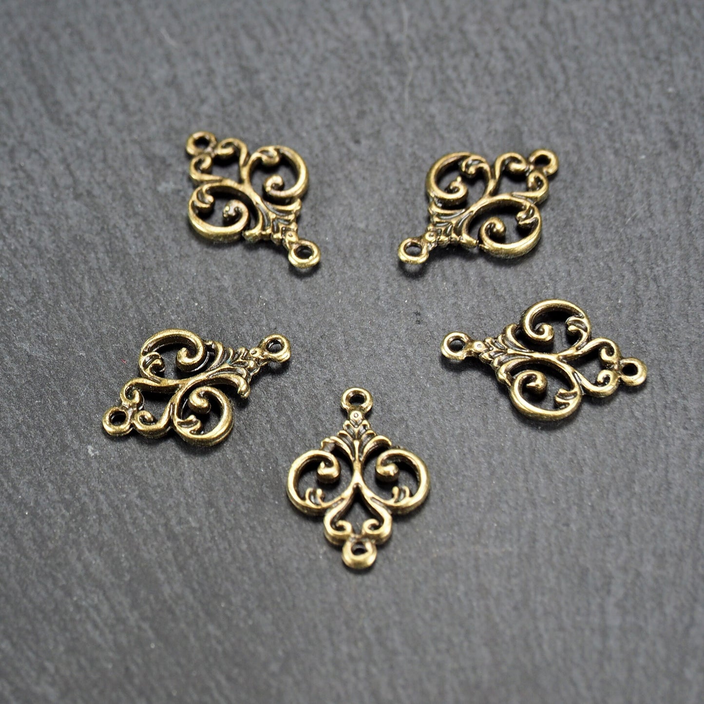 10 Verbinder filigranes Ornament, bronzefarben, 10840