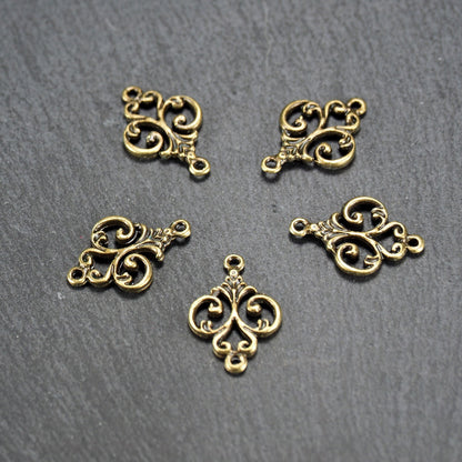 10 Verbinder filigranes Ornament, bronzefarben, 10840