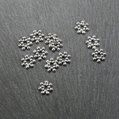 10 Spacer Perlen Blüten, antik silberfarben, 10899