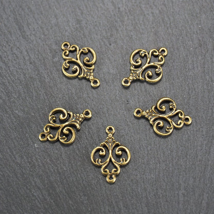 10 Verbinder filigranes Ornament, bronzefarben, 10840