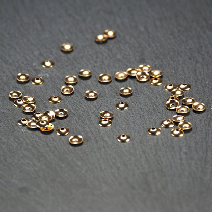 50 Mini Perlenkappen, hell vergoldet, glatt, 11000