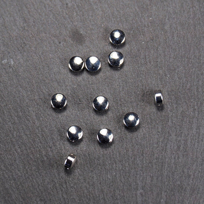 4 flachrunde Perlen, rhodiniertes Messing, 10989