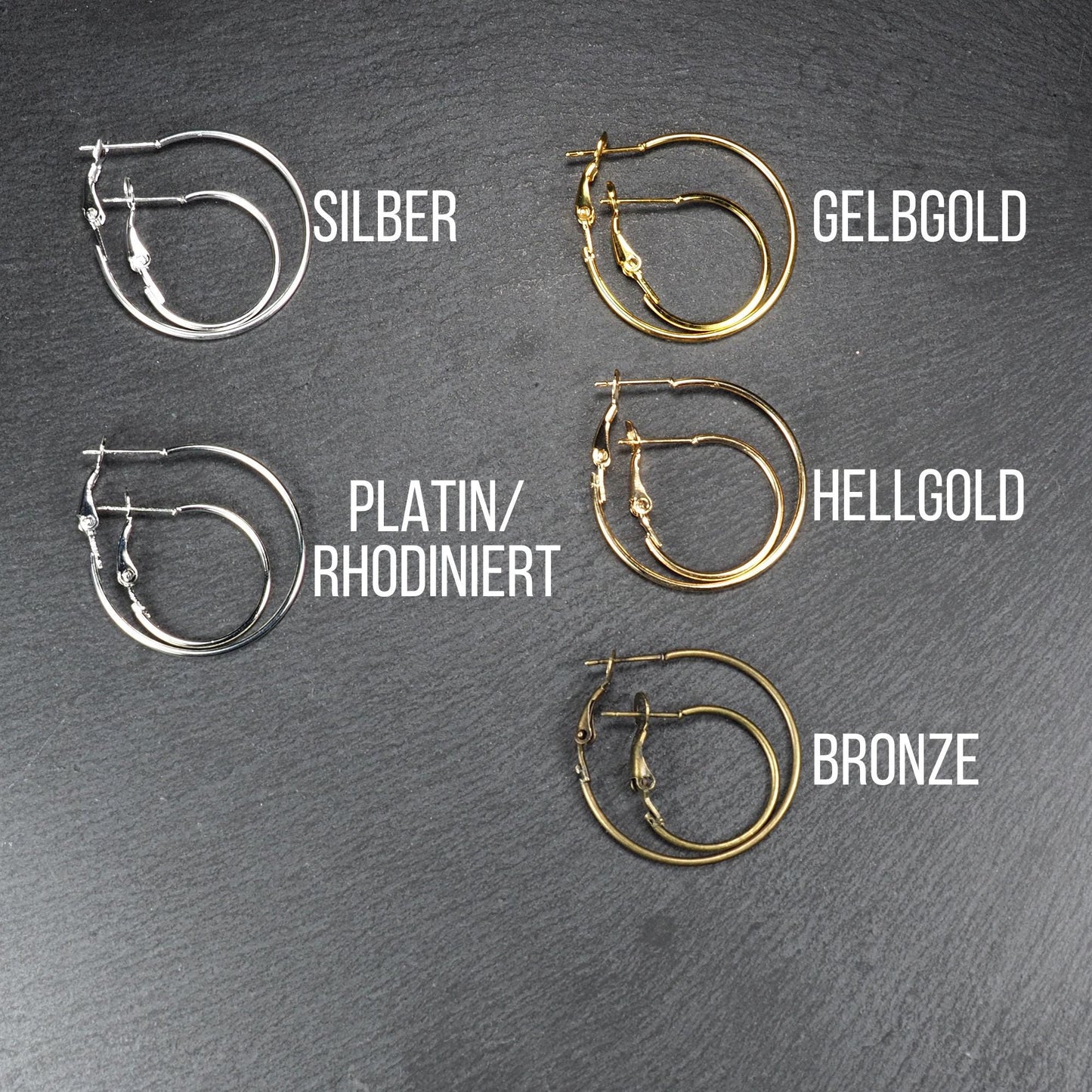 5 Paare runder Klapp-Creolen in Silber, Platin/rhodiniert, Gelbgold, Hellgold und Bronze, je mit zwei Größen und sichtbarem Klappverschluss.
