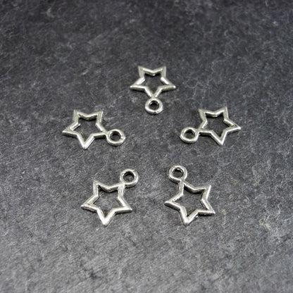 20 kleine Anhänger Stern, silberfarben, 10086