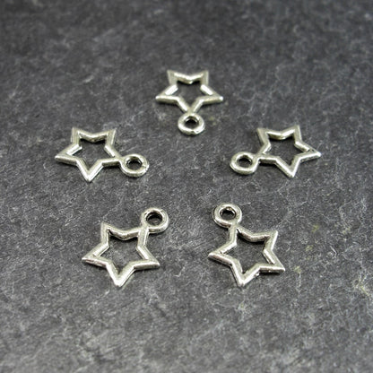 20 kleine Anhänger Stern, silberfarben, 10086