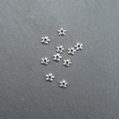 20 Spacer Perlen 4,5 mm, Blüten, silberfarben, 10216