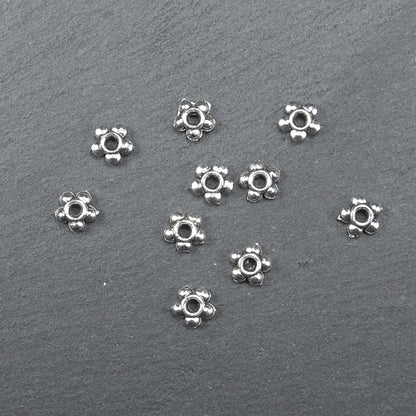 20 Spacer Perlen 4,5 mm, Blüten, silberfarben, 10216
