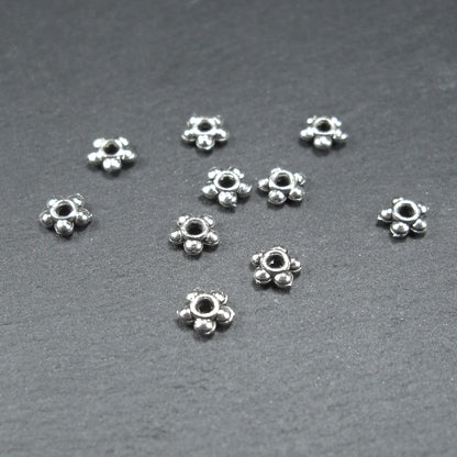 20 Spacer Perlen 4,5 mm, Blüten, silberfarben, 10216