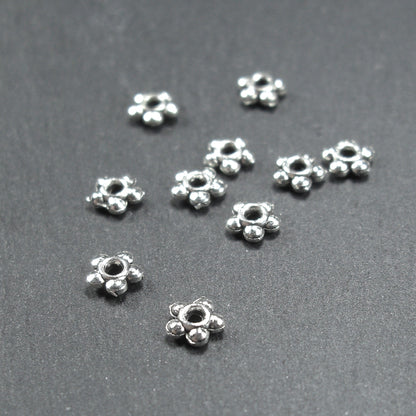 20 Spacer Perlen 4,5 mm, Blüten, silberfarben, 10216