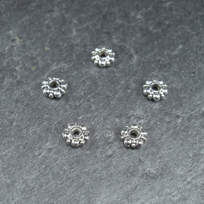 20 Spacer Perlen 6 mm, Blüten, silberfarben, 10228