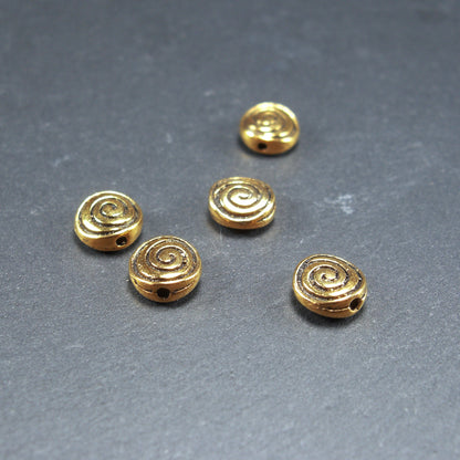 5 Perlen, Spacer, Schnecke, antik goldfarben, 10244