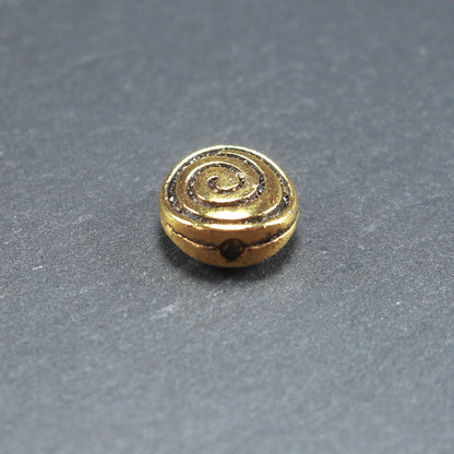 5 Perlen, Spacer, Schnecke, antik goldfarben, 10244