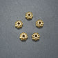 10 Spacer Perlen 7 mm, Blüten, goldfarben, 10465