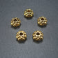 10 Spacer Perlen 7 mm, Blüten, goldfarben, 10465