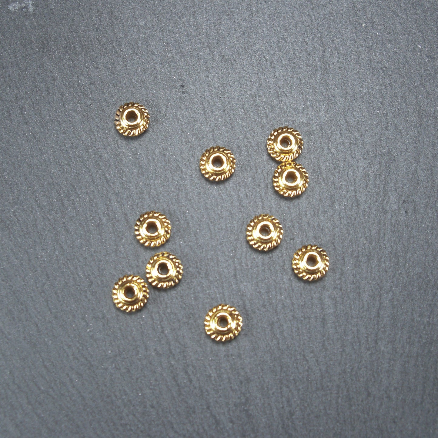 10 Spacer Perlen Rondell, antik goldfarben, 10490