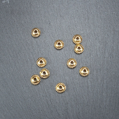 10 Spacer Perlen Rondell, antik goldfarben, 10490