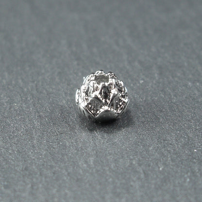 1 zauberhafte Lotos Perle, 6 x 5 mm, silberfarben, 10603