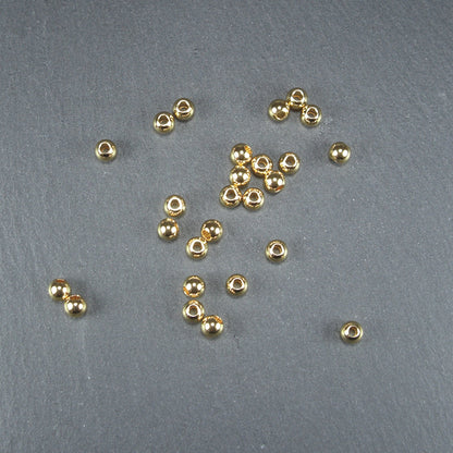 5 kleine runde Edelstahl Perlen 4 mm, goldfarben, 10634