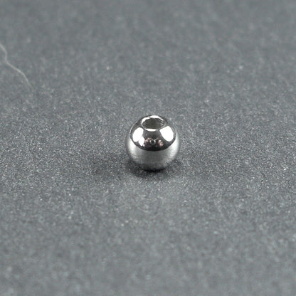 5 kleine runde Edelstahl Perlen 4 mm, 10635