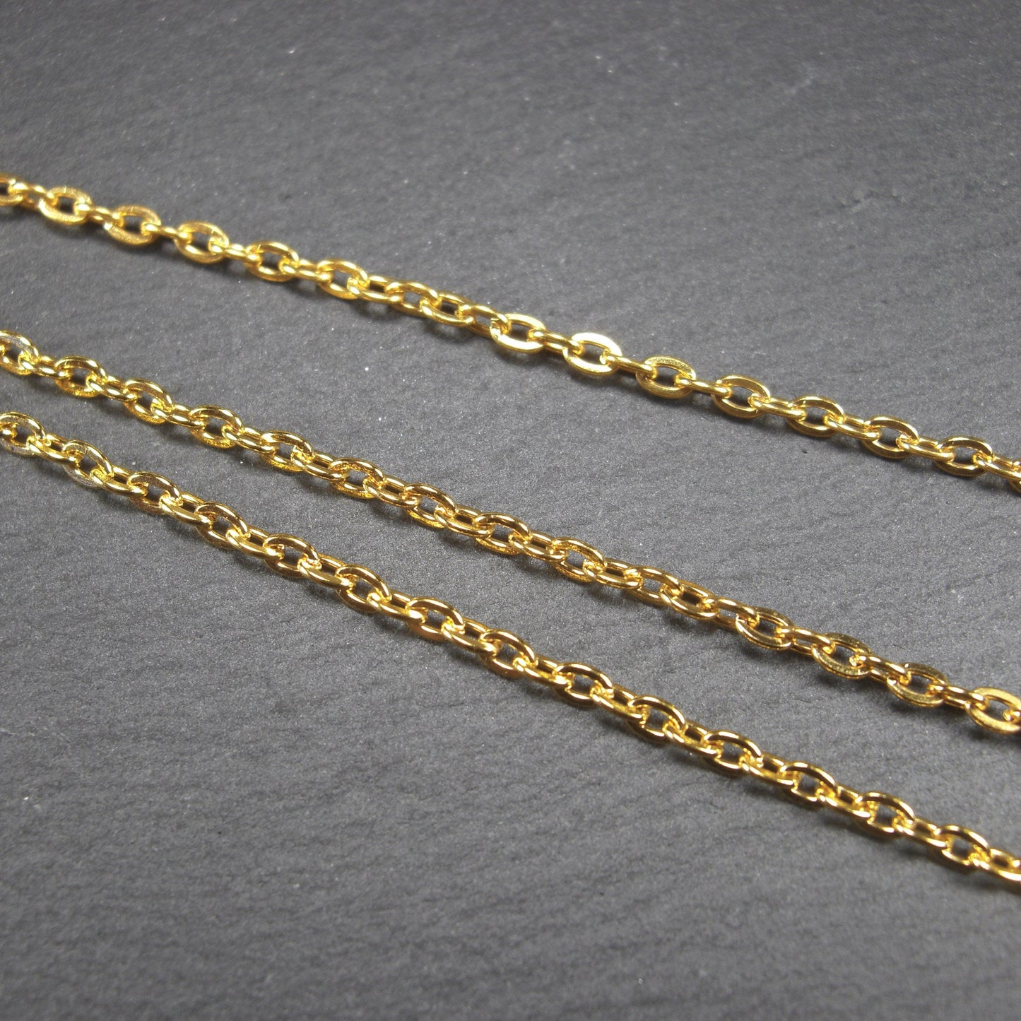 Feine Ankerkette 2 x 3 mm, Meterware, goldfarben, Eisen, 10738